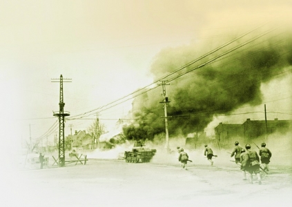 <br>          这是在淮海战役中，人民解放军突破浓烟密火，扑向国民党军的指挥所鲁楼（资料照片）。<br><br>        