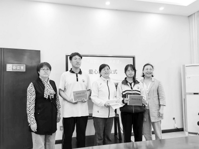 <br>          十三年如一日，爱心助学不停歇。 图片由忻州市财政国库集中收付中心提供<br><br>        