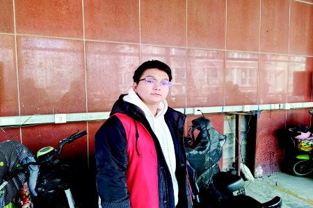           王伟乐表示，做志愿者是一件让人感到很幸福的事。        