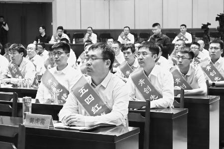           凝聚共识、鼓舞斗志。 见习记者 路诗洁 摄        