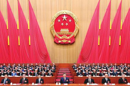 3月12日下午，第十四届全国人民代表大会第四次会议在北京人民大会堂闭幕。党和国家领导人习近平、李强、王沪宁、蔡奇、丁薛祥、李希、韩正等在主席台就座。新华社记者 谢环驰 摄